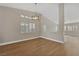 Spacious dining area with hardwood floors and large windows at 1009 Beaver Crest Ter, Henderson, NV 89015