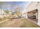 Backyard view showing a patio, landscaping, and water feature at 1010 Legacy Dr, Boulder City, NV 89005