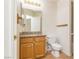 Clean bathroom with granite countertop and wood vanity at 1010 Legacy Dr, Boulder City, NV 89005