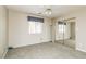 Bright bedroom with mirrored closet doors and window coverings at 1010 Legacy Dr, Boulder City, NV 89005