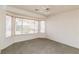 Spacious bedroom with bay window and ceiling fan at 1010 Legacy Dr, Boulder City, NV 89005