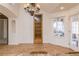 Bright dining room with hardwood floors and French doors at 1010 Legacy Dr, Boulder City, NV 89005