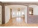 Formal dining area with brick accents and French doors at 1010 Legacy Dr, Boulder City, NV 89005