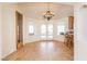 Bright dining room with hardwood floors and French doors at 1010 Legacy Dr, Boulder City, NV 89005