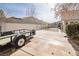 Spacious driveway with a trailer and gated access at 1010 Legacy Dr, Boulder City, NV 89005