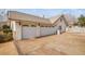 Three-car garage with attached carport at 1010 Legacy Dr, Boulder City, NV 89005