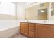 Bathroom boasts double sinks and a bathtub at 10540 Beachwalk Pl, Las Vegas, NV 89144