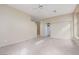 Living room with an open floor plan and neutral decor at 10540 Beachwalk Pl, Las Vegas, NV 89144