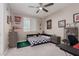 Bedroom with a football-themed bed and a birdcage at 10936 White Alder Pl, Las Vegas, NV 89138