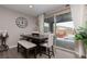 Bright dining area with sliding doors leading to the patio at 10936 White Alder Pl, Las Vegas, NV 89138