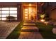 Elegant entryway with brick pavers and landscape lighting at 10936 White Alder Pl, Las Vegas, NV 89138