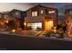 Two-story home with modern facade and landscaped yard at 10936 White Alder Pl, Las Vegas, NV 89138