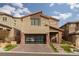 Two-story home with modern facade and landscaped yard at 10936 White Alder Pl, Las Vegas, NV 89138