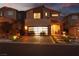 Two-story home with modern facade and landscaped yard at 10936 White Alder Pl, Las Vegas, NV 89138