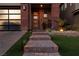 Brick paver walkway leading to a modern front door entrance at 10936 White Alder Pl, Las Vegas, NV 89138