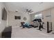 Large loft area with home gym equipment and media area at 10936 White Alder Pl, Las Vegas, NV 89138