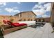 Stunning pool and patio with red lounge chairs at 10936 White Alder Pl, Las Vegas, NV 89138