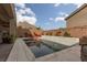 Backyard pool and patio area with mountain views at 10936 White Alder Pl, Las Vegas, NV 89138