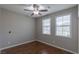 Cozy bedroom with natural light, hardwood floors, and neutral walls at 11106 Cherokee Landing St, Las Vegas, NV 89179