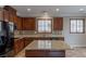 Well-appointed kitchen featuring granite countertops, stainless appliances, and a center island at 11106 Cherokee Landing St, Las Vegas, NV 89179