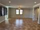 Large living room featuring tile floors and neutral walls at 11106 Cherokee Landing St, Las Vegas, NV 89179