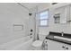 Bathroom with tub, shower, and dark vanity at 11157 Sandrone Ave, Las Vegas, NV 89138