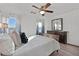 Bedroom with wood bed frame and window at 11157 Sandrone Ave, Las Vegas, NV 89138