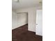 Bedroom with mirrored closet doors and brown carpet at 11185 Saddle Iron St, Las Vegas, NV 89179