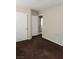 Bedroom with brown carpet and double door closet at 11185 Saddle Iron St, Las Vegas, NV 89179