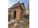 Two-story house with a light brown facade and a front porch at 11185 Saddle Iron St, Las Vegas, NV 89179