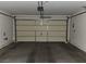 Clean and spacious garage with an automatic door at 11185 Saddle Iron St, Las Vegas, NV 89179