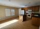 Bright kitchen featuring an island and ample cabinet space at 11185 Saddle Iron St, Las Vegas, NV 89179