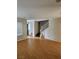 Living room with wood-look flooring and staircase at 11185 Saddle Iron St, Las Vegas, NV 89179