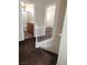 Upstairs hall with carpet and a view into a bathroom at 11185 Saddle Iron St, Las Vegas, NV 89179