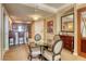 Elegant dining area with glass table and four chairs at 125 E Harmon Ave # 1702, Las Vegas, NV 89109