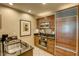 Modern kitchen with stainless steel appliances and breakfast bar at 125 E Harmon Ave # 1702, Las Vegas, NV 89109