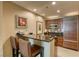 Modern kitchen with stainless steel appliances and breakfast bar at 125 E Harmon Ave # 1702, Las Vegas, NV 89109