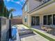 Relaxing backyard with a water feature, fire pit, and seating at 12846 Ringrose St, Las Vegas, NV 89141