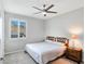 Bright bedroom with carpeted floor and ceiling fan at 12846 Ringrose St, Las Vegas, NV 89141