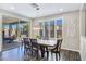 Bright dining room with sliding doors leading to backyard at 12846 Ringrose St, Las Vegas, NV 89141