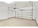 Attached garage with automatic door opener and epoxy flooring at 12846 Ringrose St, Las Vegas, NV 89141