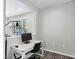 Bright home office with simple desk and modern lamp at 12846 Ringrose St, Las Vegas, NV 89141