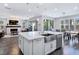 Modern kitchen features stainless steel appliances and white shaker cabinets at 12846 Ringrose St, Las Vegas, NV 89141