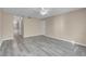 Large bedroom featuring gray vinyl flooring and access to bathroom at 1575 W Warm Springs Rd # 911, Henderson, NV 89014