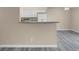 Kitchen features granite countertops and white cabinets at 1575 W Warm Springs Rd # 911, Henderson, NV 89014