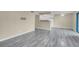 Open living area with wood-look floors at 1575 W Warm Springs Rd # 911, Henderson, NV 89014