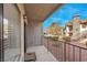 Private patio with metal railing and sliding glass door at 1575 W Warm Springs Rd # 911, Henderson, NV 89014