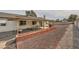 Large backyard with gravel landscaping and patio at 1688 Crest Ave, Las Vegas, NV 89119