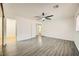 Bright bedroom with wood-look floors and ceiling fan at 1688 Crest Ave, Las Vegas, NV 89119