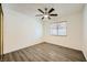 Bedroom with ceiling fan and window with blinds at 1688 Crest Ave, Las Vegas, NV 89119